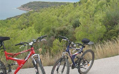 Sailing Greek islands - Greece charter sailing holidays - Riding the bycicle in the islands