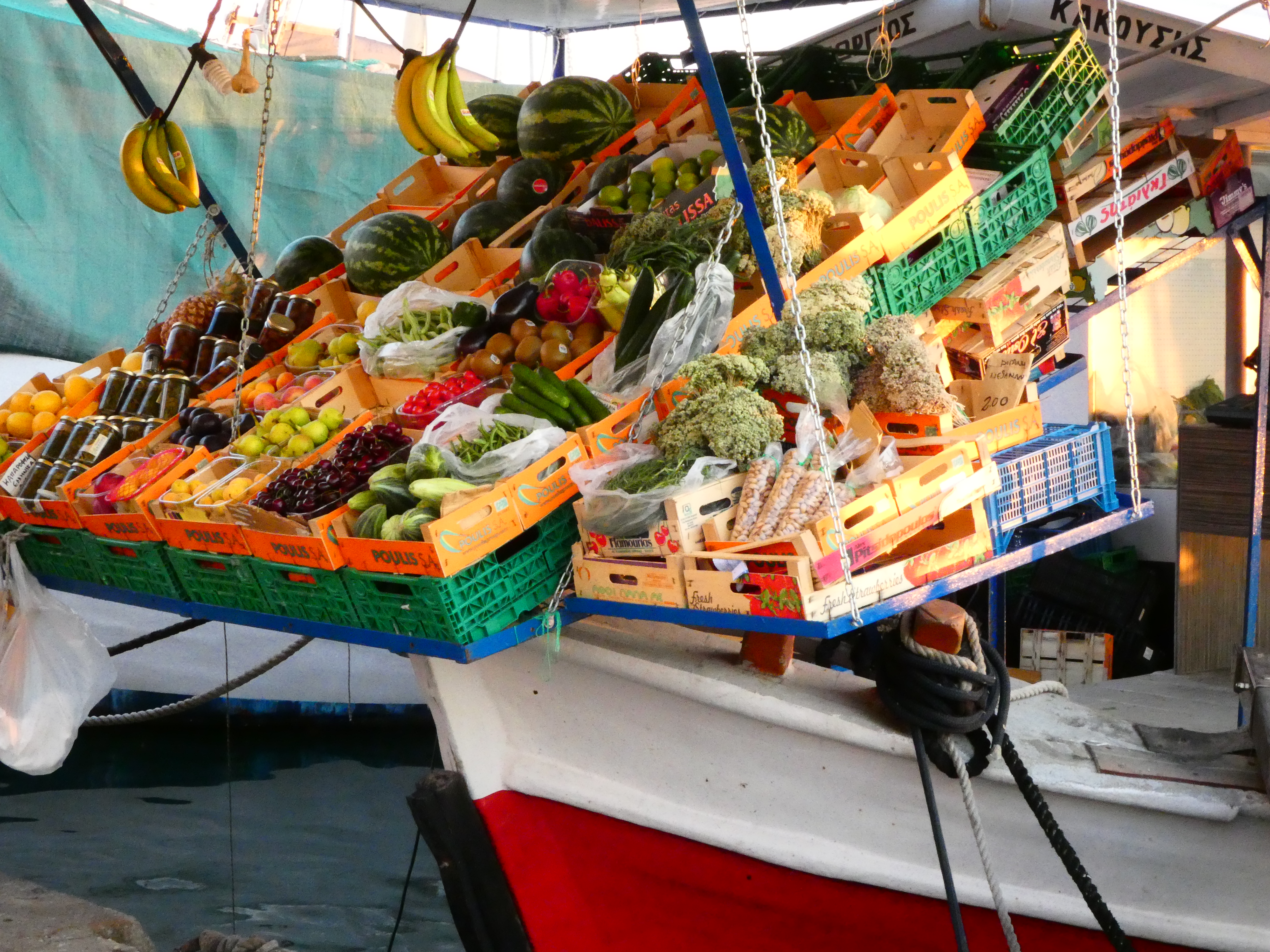 Vegan boat charter Greece fresh produce market for island provisioning